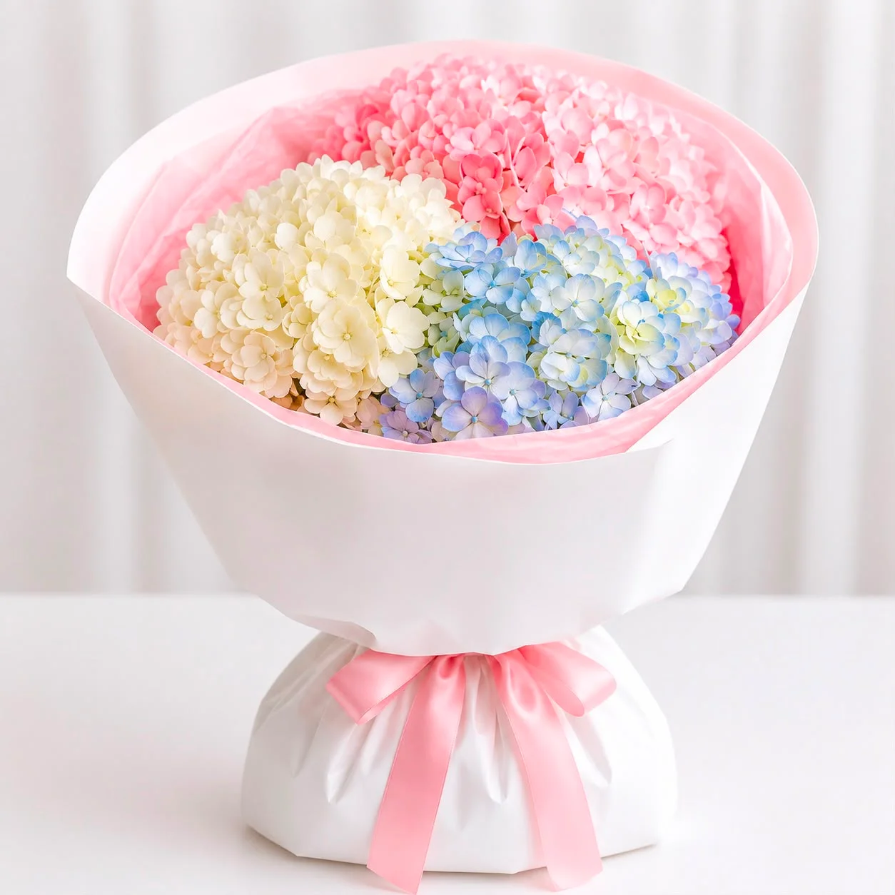 UAE Women’s Day flower bouquet featuring pink, white and blue hydrangeas in a meaningful elegant arrangement